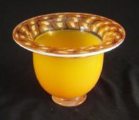 Blown Glass: Footed Orange Incalmo Bowl was footed orange with millifiores and a white lip wrap. This bowl measures approximately 10"