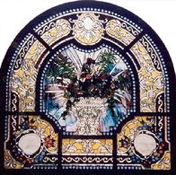 The intricate design in "Beveled Bouquet" contains many wheel-cut bevels.  Approximately 7 1/2' X 7 1/2'.  Two rows of antique jewels grace its inside and outside borders. A lovely floral bouquet in a beveled vase.